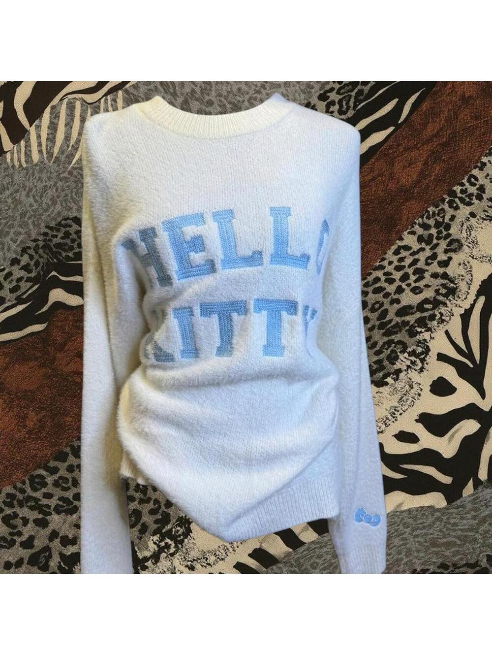 very oversized Hello Kitty white and blue sweater Size S